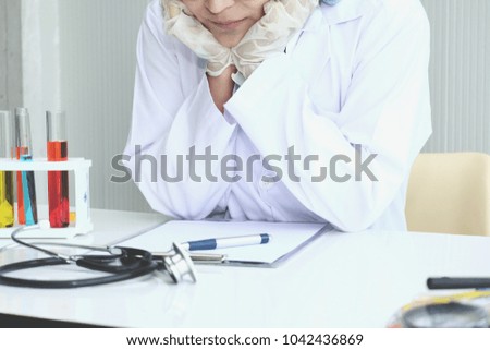 Pensive mood scientist woman in lab , woman feeling worried while searching in laboratory 