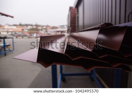 Piece of metal sheet with blurry background