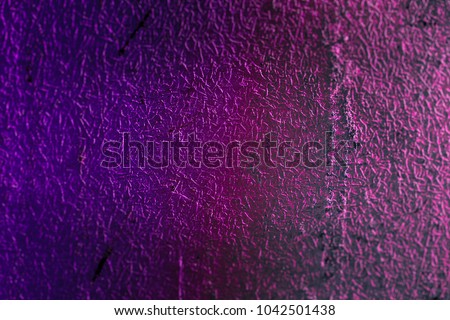 Color texture of the surface with scratches and abrasions. There is vignetting. Can be used as a background for an inscription or design.
