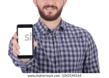 A close-up shot of a man's hand raising a phone, showing the mobile's white screen, isolated on a white background.