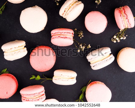 traditional french colorful macarons, dark