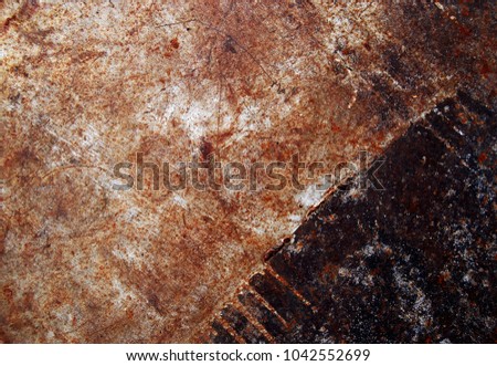 Old weathered painted wall, rusty scratched metal texture