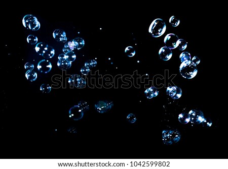 AIR BUBBLES ISOLATED ON BLACK BACKGROUND