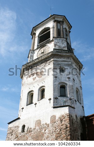 Medieval clock tower in Vyborg, a vertical picture