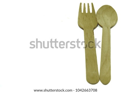 Spoons and forks made of wood On a white background