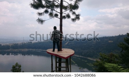alone in the forest with clouds and forest background. be calm and cool on lake