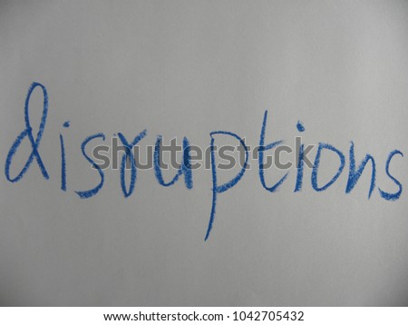Text disruptions hand written by blue oil pastel on white color paper