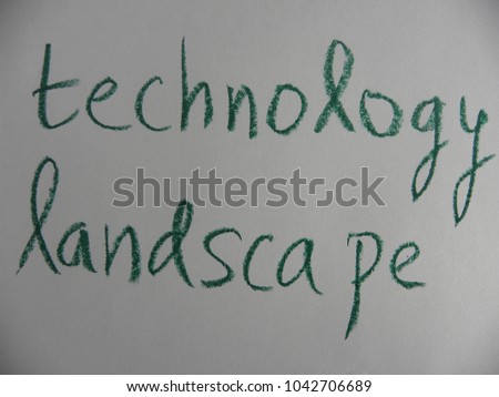 Text technology landscape hand written by green oil pastel on white color paper