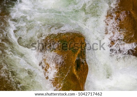 forest stream. Vibrant water. Stones in the water. blue clear water. fast flow