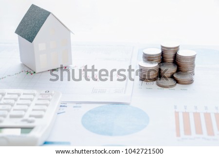 Concept stethoscope house graph and coin