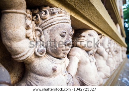 Bas-reliefs on the wall. Kelaniya Rajamaha Viharaya temple, Colombo, Sri Lanka