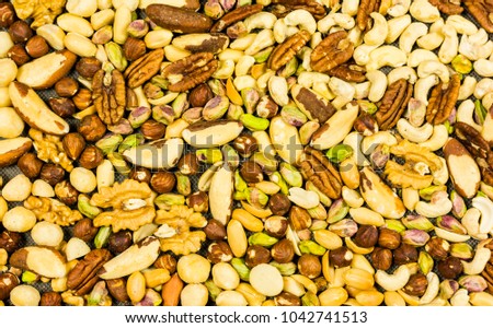Abstract mix of nuts as a background, texture or pattern.