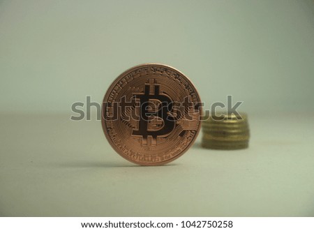Golden bitcoin isolated on white background. Digital currency. Cryptocurrency. Physical bit coin.
