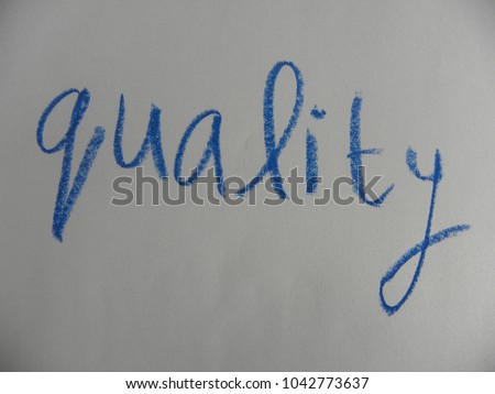 Text quality hand written by blue oil pastel on white color paper