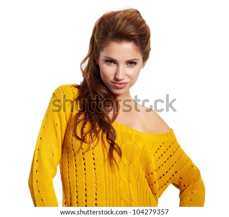 Portrait of a beautiful young female model posing against white background