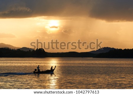 Silhouette picture of typical fisher man boat in sunset/Krabi/Thailand