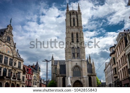 The 91-metre-tall belfry of Ghent, Belgium, Europe on a bright summer day with blue sky