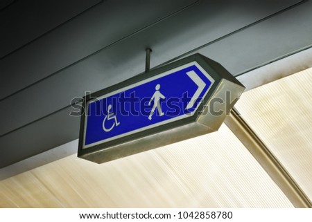 Symbolic labels. Displays the path and way for people with wheelchair.
