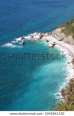 Beautiful sea with rocks shore. Sea wave. Seascape. Summer landscape.Transparent sea water. turquoise water