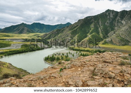 The Katun River in the background of the mountain. Altai, Russia