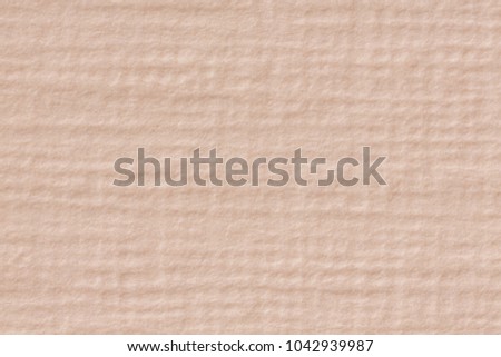 Close up shot of light brown recycled paper texture background. High resolution photo.