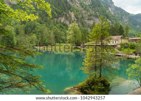 Spectacular panoramic view of the Blausee or Blue Lake nature park in the Bernese Alps, Kandersteg, Bern canton, Jungfrau region, Switzerland