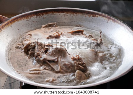 Boiled Soup with  chicken Ribs  in a pan .