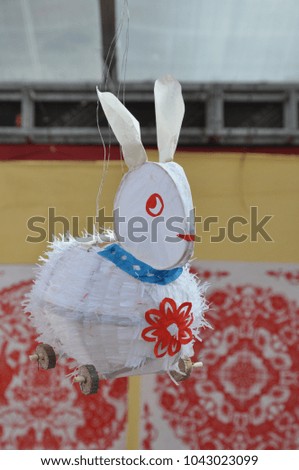 A rabbit with paper.