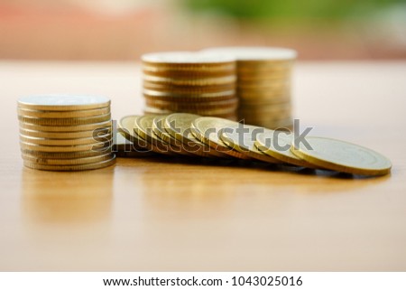 Collection of coins in different levels represent business or earning income concept. Business, finance concept background. 