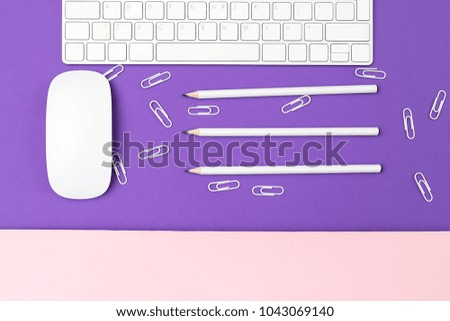 Desktop with keyboard and stationery. Flat lay