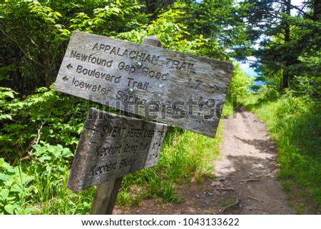 The Appalachian Trail. Path in the woods and wooden signs in Great Smoky Mountains National Park in Tennessee. 