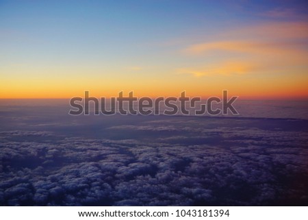 Abstract Sunset Photo from Airplane, Sunset sky background, pictured from 
plane. Beautiful sky as twilight times, Space for text in template. 