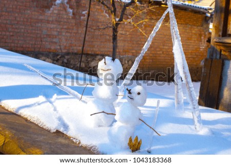 happy snowman on snow, winter background