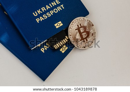 ukraine passports and bitcoin coin ukraine and cryptocurrency concept isolated on white