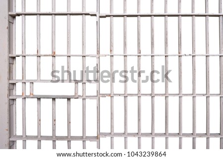 Prison bars isolated on white background Royalty-Free Stock Photo #1043239864