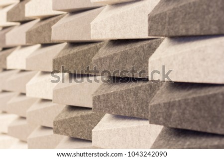 acoustic foam wall pattern random color grey tone background.
