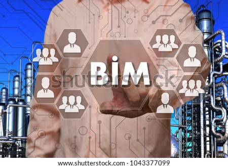 An elderly businessman chooses Building Information Modeling, BIM on the touch screen with a industrial background
