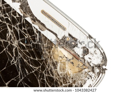 Close-up macro of a broken dark glass. Smartphone sensor on a white background