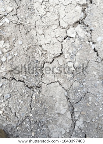 cracked by drought the ground, black and white picture