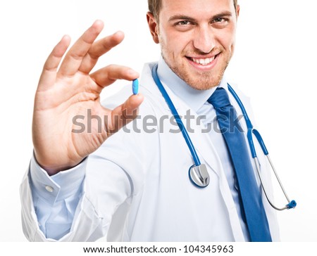 Doctor giving you a pill Royalty-Free Stock Photo #104345963