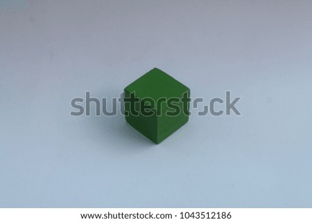 Square cylinder wooden block on white background