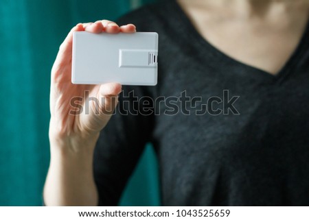woman holding usb flash bussines card template mock up,