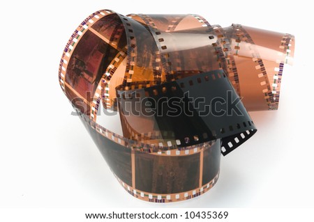 image of curling 35mm  negative photo film against white background