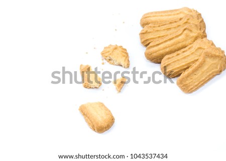 Homemade round ginger biscuit with jam, peanuts and raisins. Delicious honey sweetmeal digestive cookie isolated on a white background with light shadow. Cooking concept. Detailed closeup studio shot