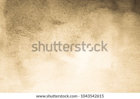 Blank aged paper sheet as old dirty frame background with dust and stains. Front view. Vintage and antique art concept. Detailed closeup studio shot. Sepia toned