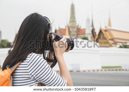 tourist taking photo in Bangkok, Thailand