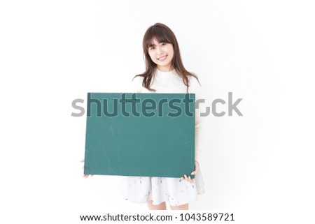 Woman having blackboard