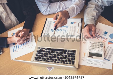 Teamwork of business colleagues, consultation and conference new strategy plan business and market growth on financial document graph report, professional occupation, Partner meetings and briefing.