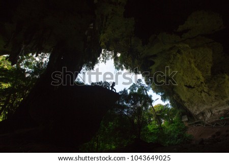Photographers take pictures around the area within the cave, Niah National Park, located within Miri Division, Sarawak, Malaysia, is the site of the Niah Caves limestone cave and archeological site.
