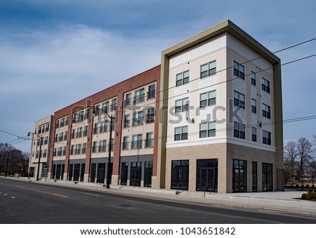 Urban Apartment Building, Renovated Warehouse Royalty-Free Stock Photo #1043651842